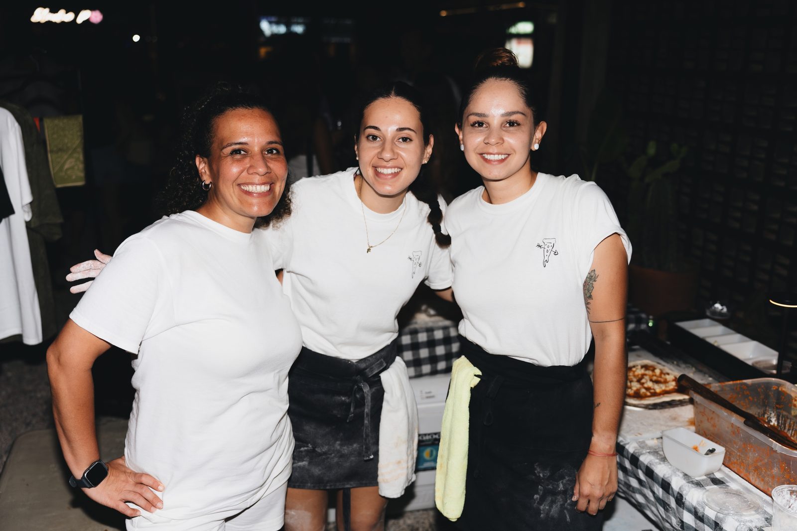 The Holy Crust crew photographed together at an event