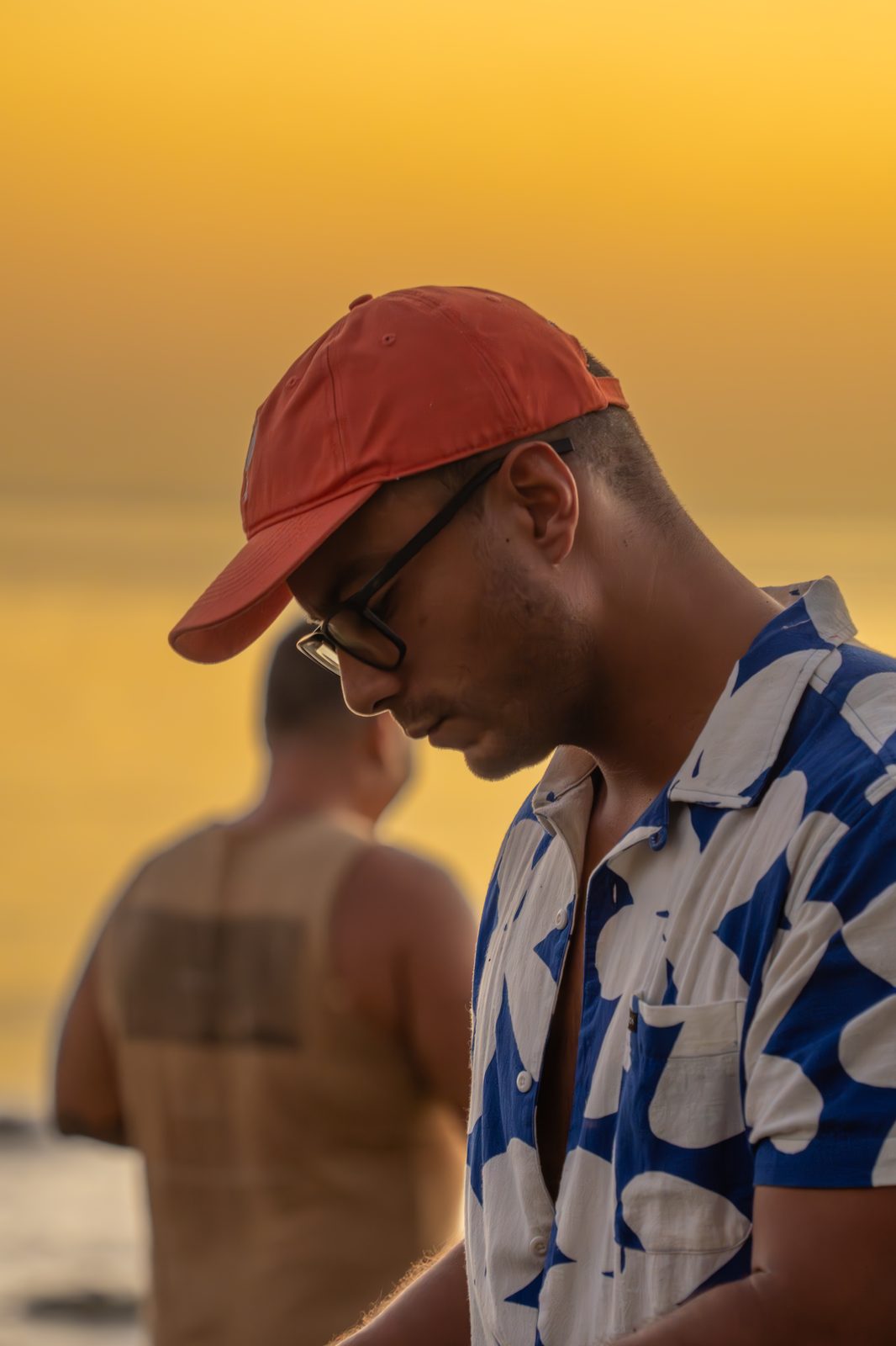 A DJ playing at a Holy Crust sunset event