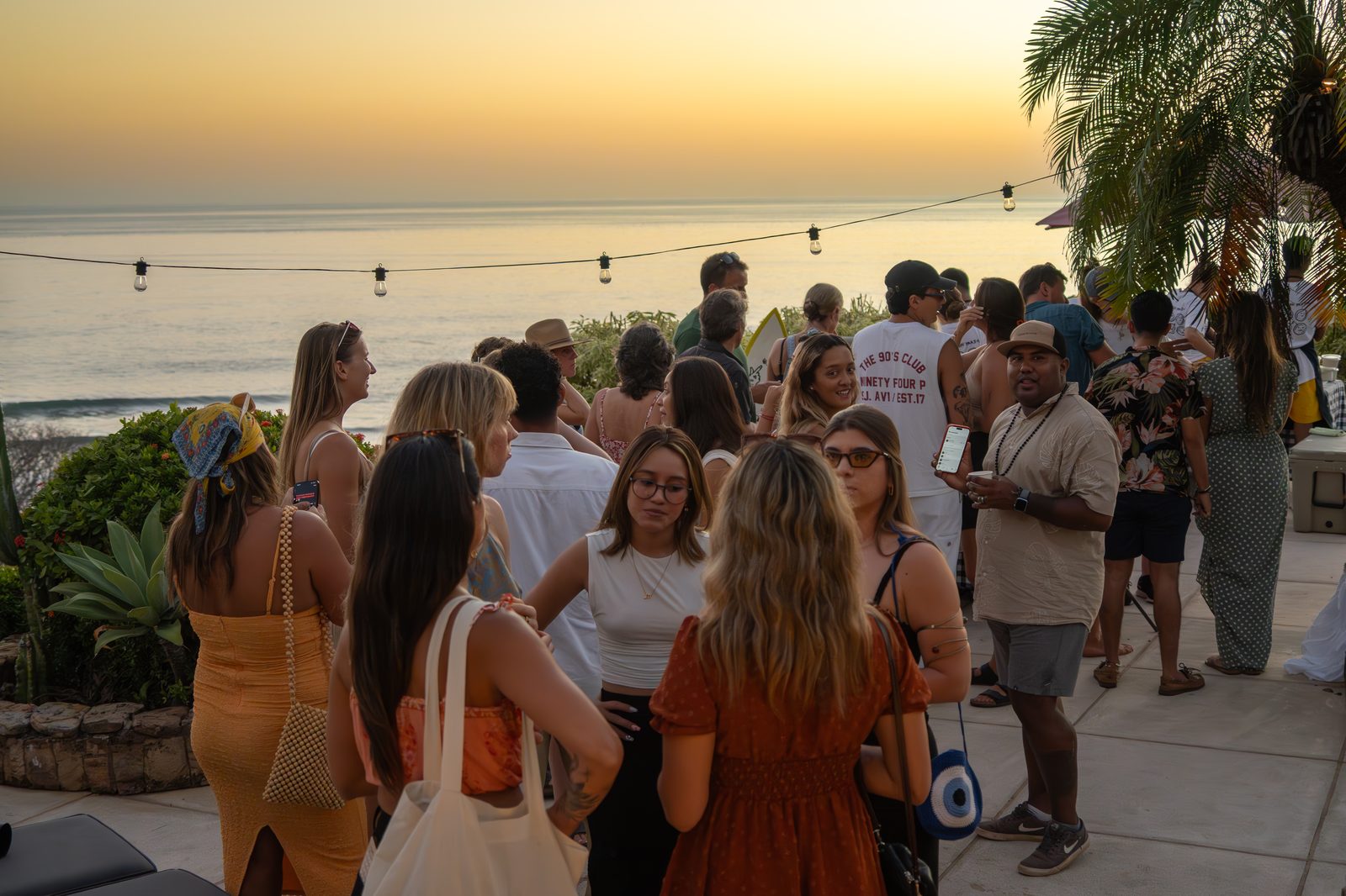 A crowd at a public Holy Crust event at sunset